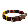 The Country Direct Royal Army Veterinary Corps Leather Dog Collar made in partnership with Pampeano, featuring red, blue, and yellow wax thread detailing. 