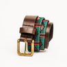 Close-up highlighting the buckle of the Country Direct & Pampeano Rifles Leather Polo Belt, made with the finest leather, featuring red and green wax thread detailing.